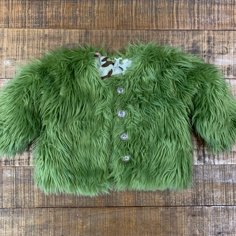 Green fur coat with cute pink buttons